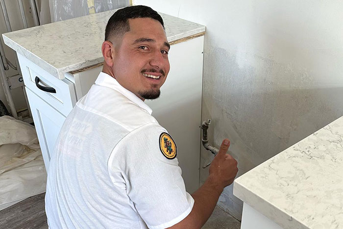 Happy Camper Plumber performing a Gas Leak Repair in Whittier CA